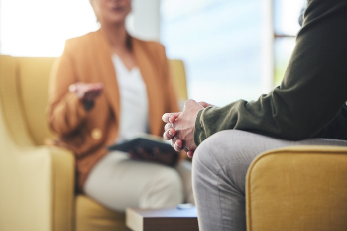 behavioral health specialist speaking with a patient