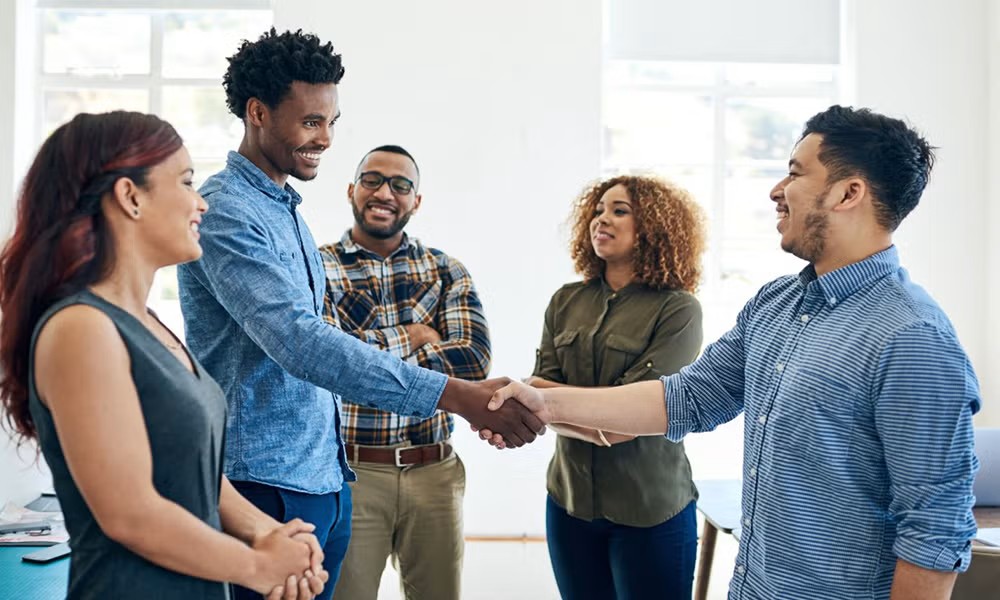 new employees shaking hands